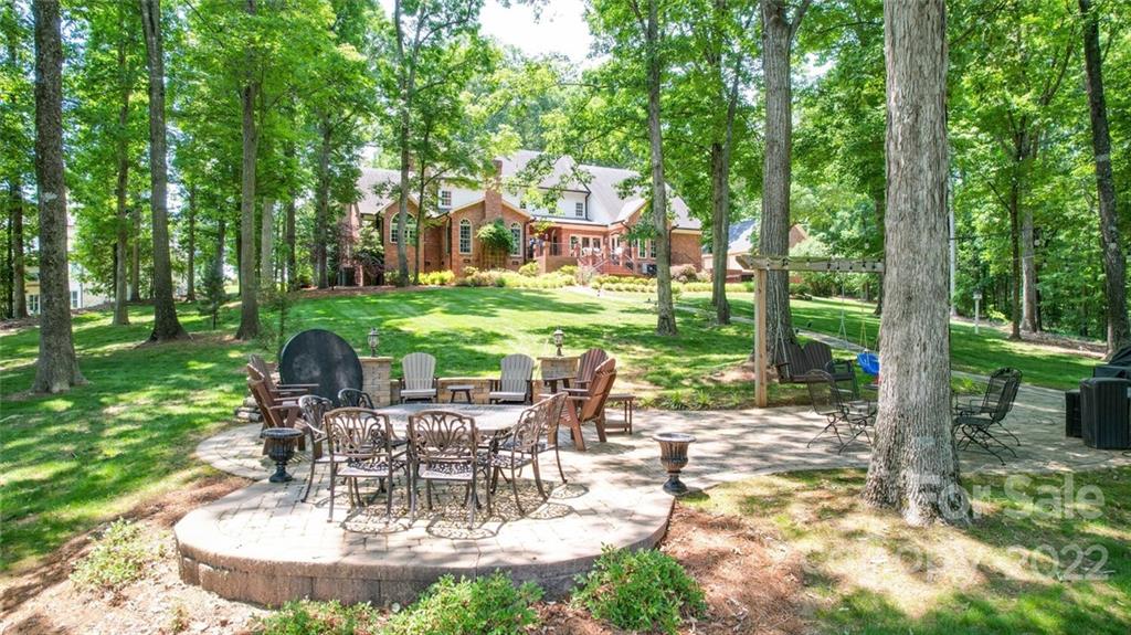 3617 Lake Twitty Drive Monroe, NC 28110 - Photo 12 of 47 a view of a house with backyard sitting area and garden