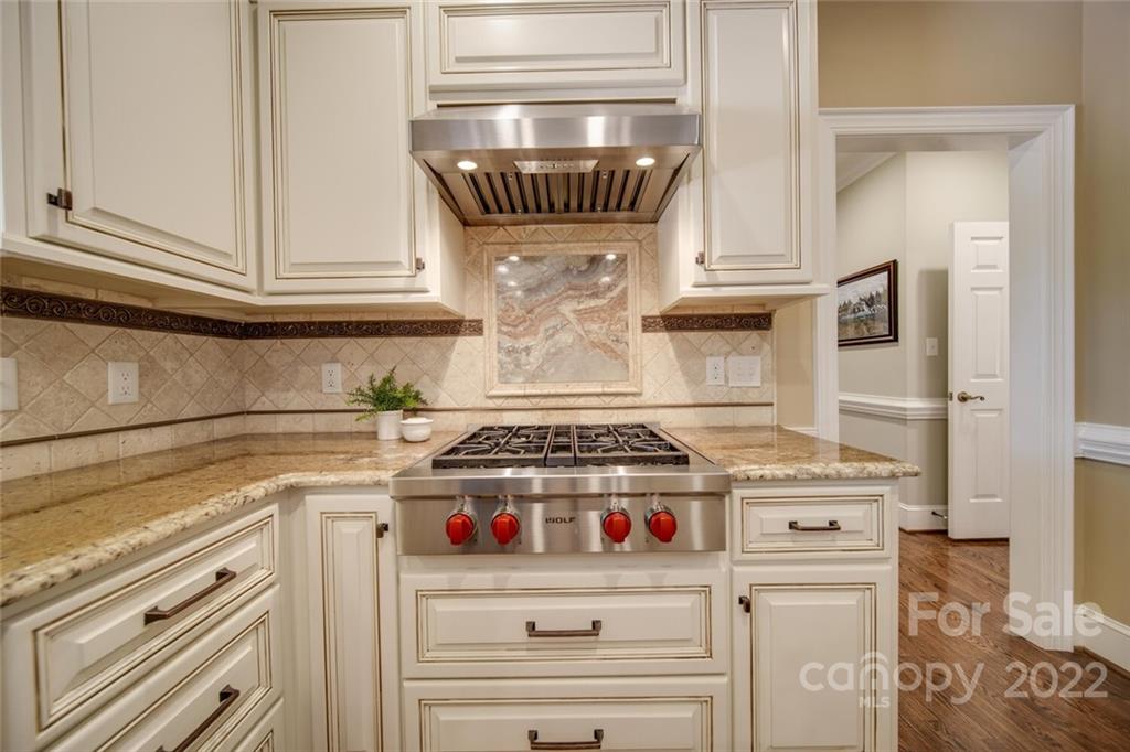 3617 Lake Twitty Drive Monroe, NC 28110 - Photo 21 of 47 a kitchen with a stove and cabinets