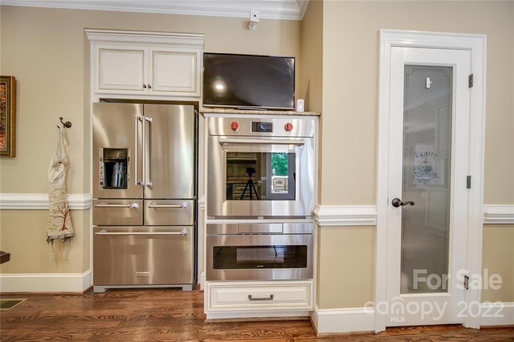 3617 Lake Twitty Drive Monroe, NC 28110 - Photo 22 of 47 a kitchen with stainless steel appliances and cabinets