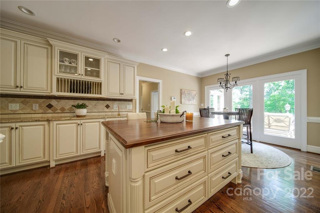 3617 Lake Twitty Drive Monroe, NC 28110 - Photo 25 of 47 a kitchen with white cabinets and window
