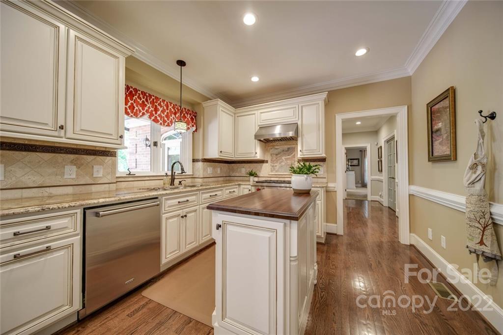 3617 Lake Twitty Drive Monroe, NC 28110 - Photo 26 of 47 a kitchen with stainless steel appliances granite countertop a sink and cabinets