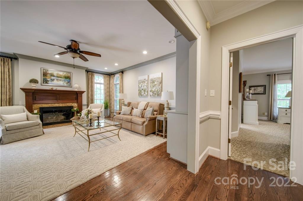 3617 Lake Twitty Drive Monroe, NC 28110 - Photo 28 of 47 a living room with furniture and a fireplace