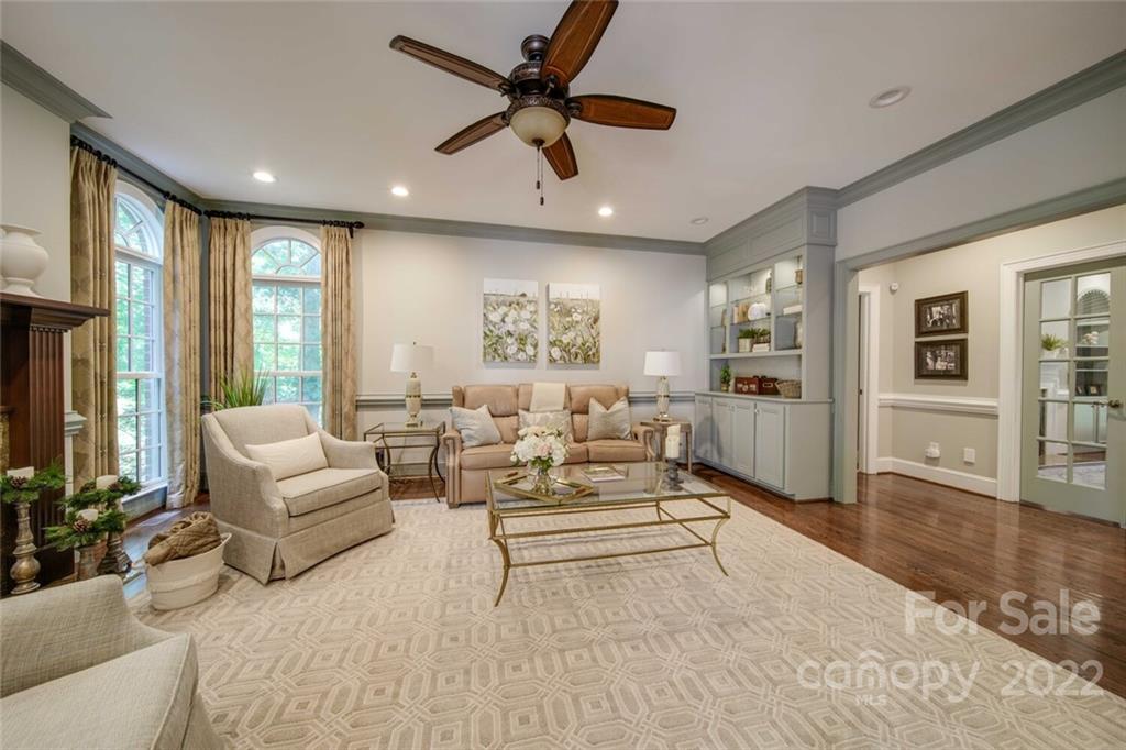 3617 Lake Twitty Drive Monroe, NC 28110 - Photo 30 of 47 a living room with furniture ceiling fan and a rug