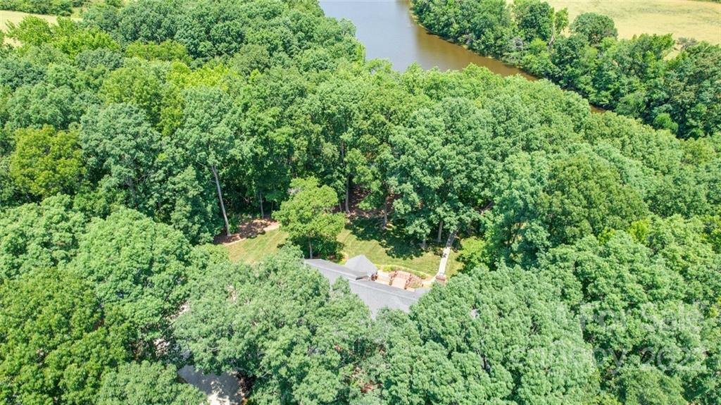 3617 Lake Twitty Drive Monroe, NC 28110 - Photo 4 of 47 an aerial view of a house with a yard