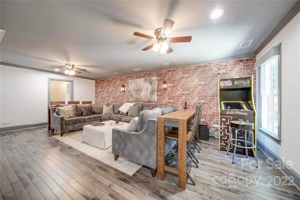 3617 Lake Twitty Drive Monroe, NC 28110 - Photo 42 of 47 a living room with furniture and a flat screen tv