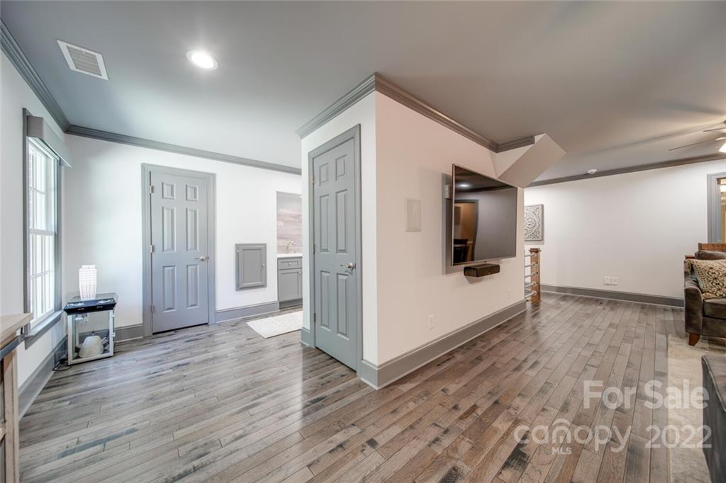 3617 Lake Twitty Drive Monroe, NC 28110 - Photo 44 of 47 a view of a livingroom with wooden floor and furniture