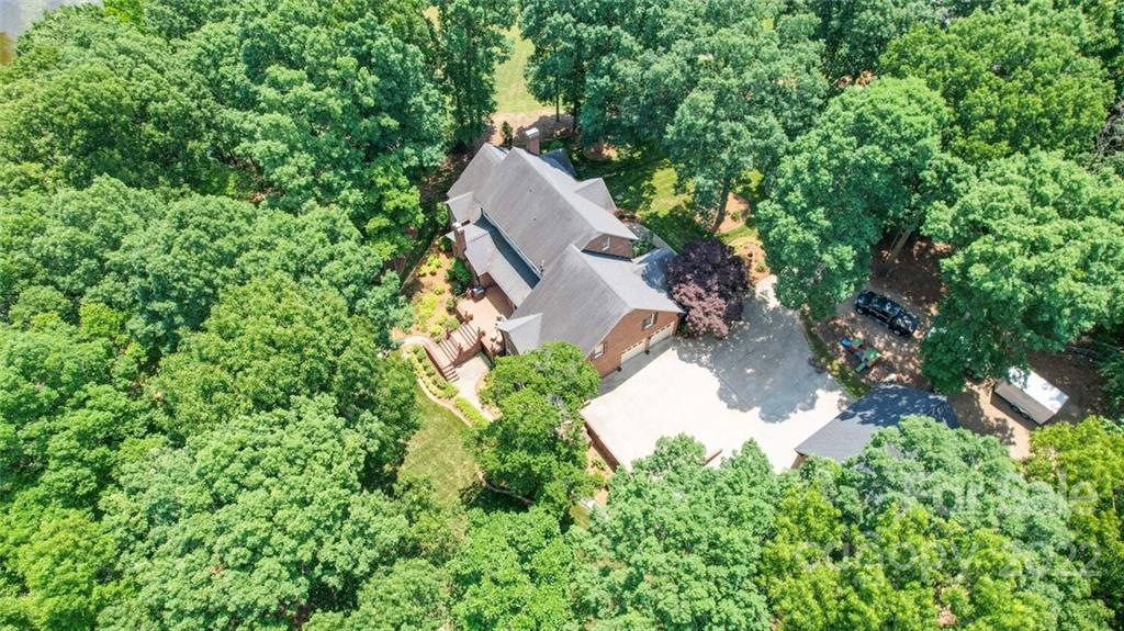3617 Lake Twitty Drive Monroe, NC 28110 - Photo 6 of 47 an aerial view of a house with a yard and plants