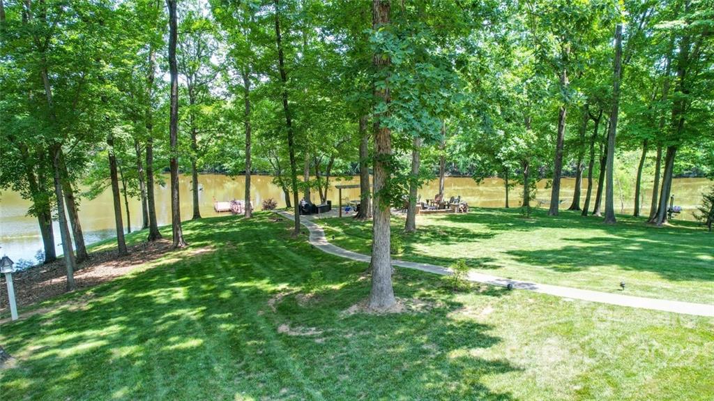 3617 Lake Twitty Drive Monroe, NC 28110 - Photo 7 of 47 a view of white house with a big yard