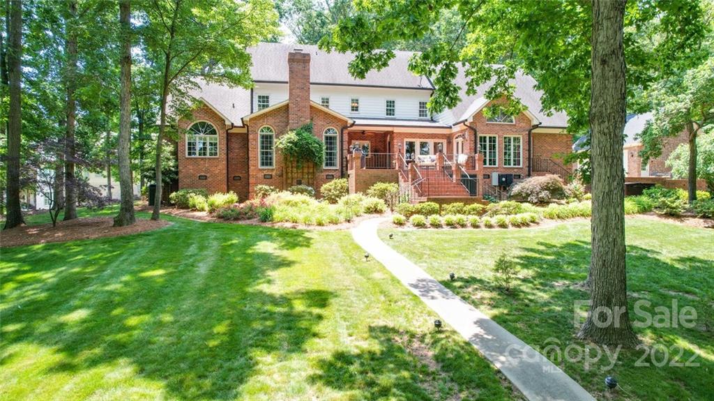 3617 Lake Twitty Drive Monroe, NC 28110 - Photo 10 of 47 a front view of a house with garden