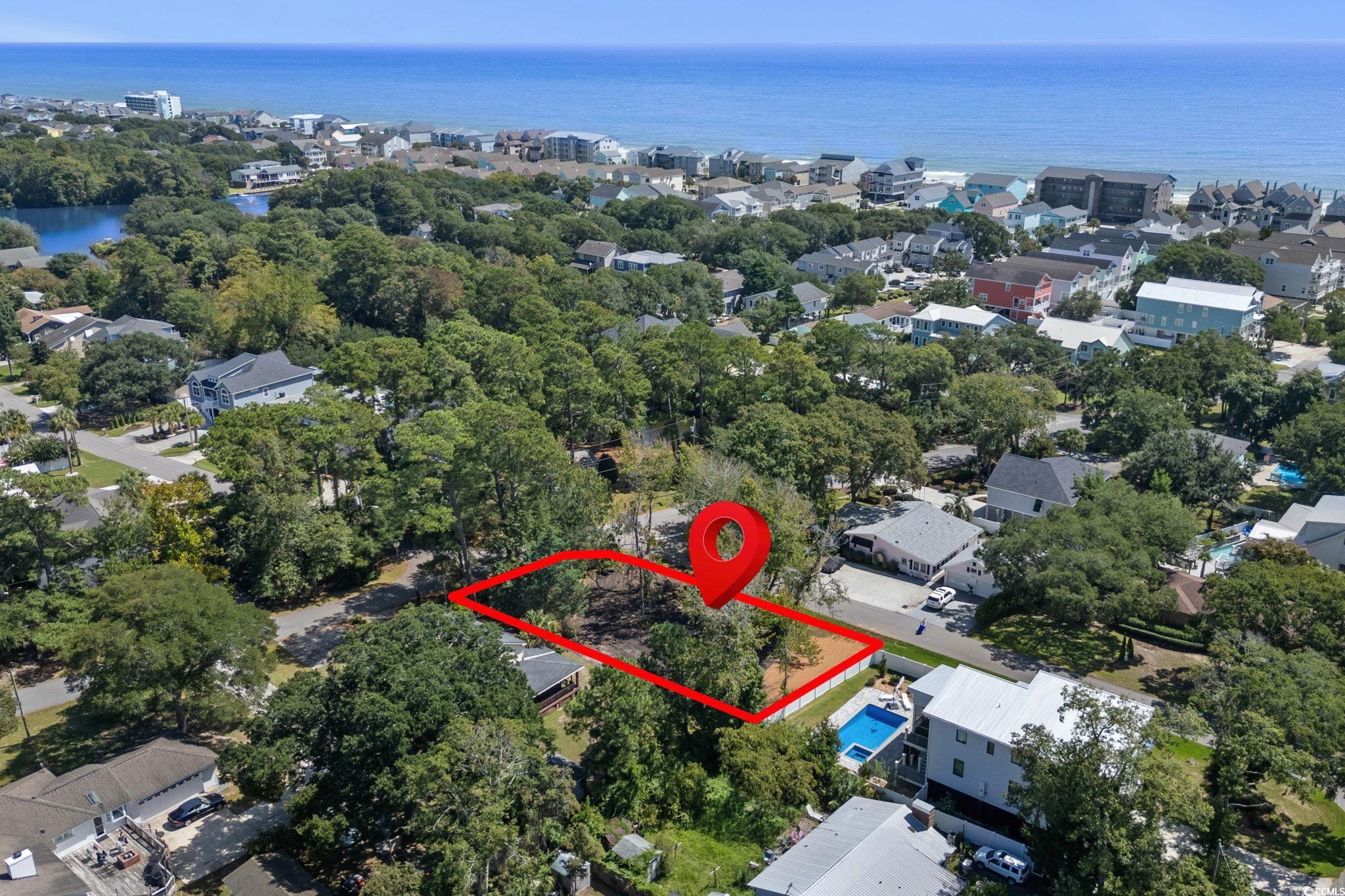 511 7th Avenue North Surfside Beach, SC 29575 - Photo 4 of 24 Aerial view of residential area with property boun