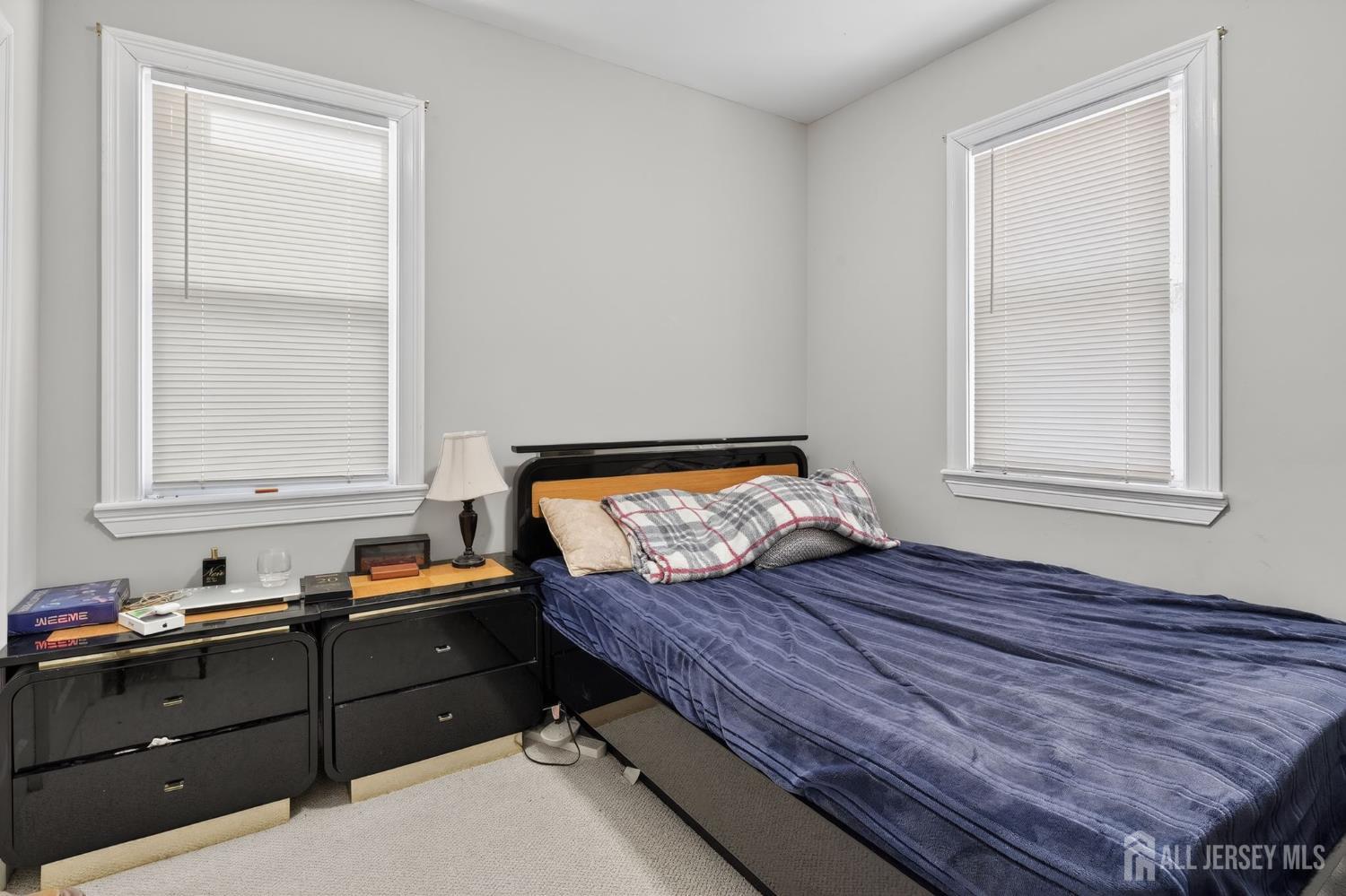 441 South Clinton Street East Orange, NJ 07018 - Photo 21 of 27 a bed room with furniture and window