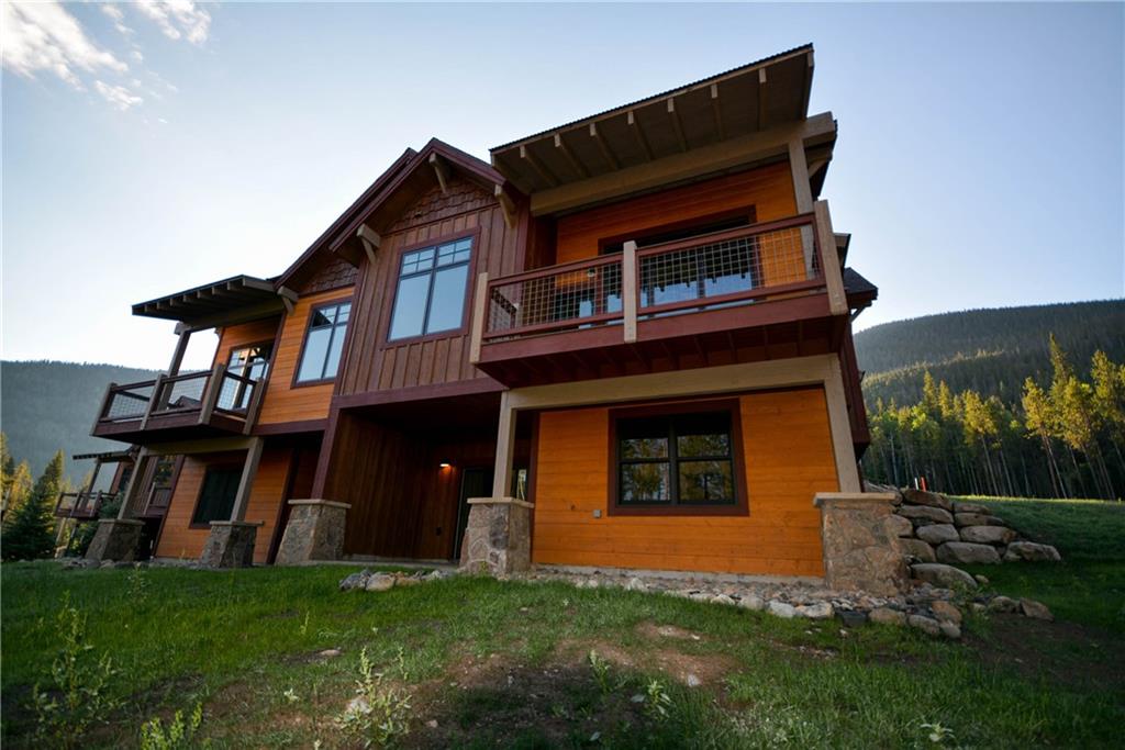 876 Independence Road, Unit 1B Keystone, CO 80435 - Photo 22 of 25 a front view of a house with a yard
