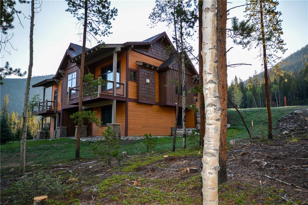 876 Independence Road, Unit 1B Keystone, CO 80435 - Photo 25 of 25 a front view of a house with garden