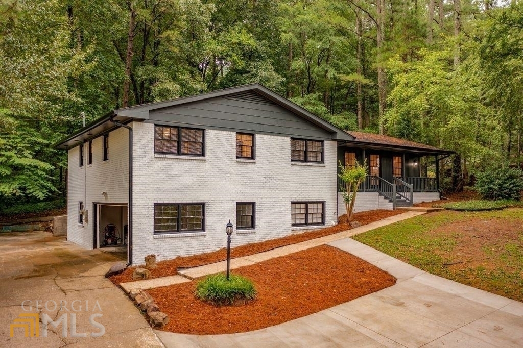 108 North Tibbs Road Dalton, GA 30720 - Photo 1 of 1 a view of a house with entertaining space