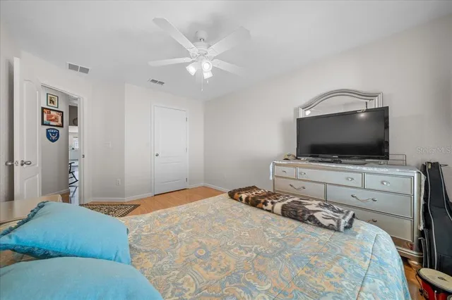 an aerial view of a house with yard swimming pool and outdoor seating