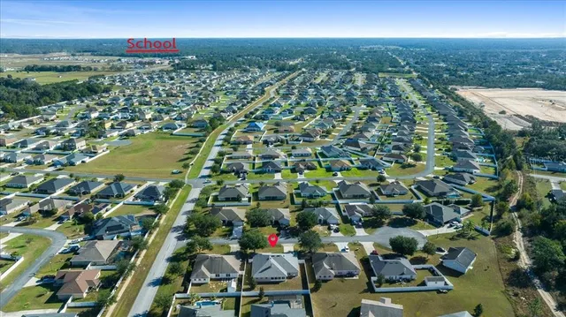 a view of a house with a big yard