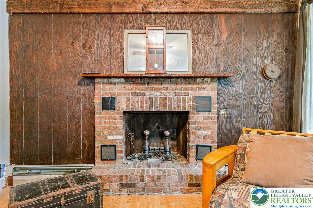 174 North Chestnut Street Bath, PA 18014 - Photo 5 of 20 a living room with furniture and a fireplace