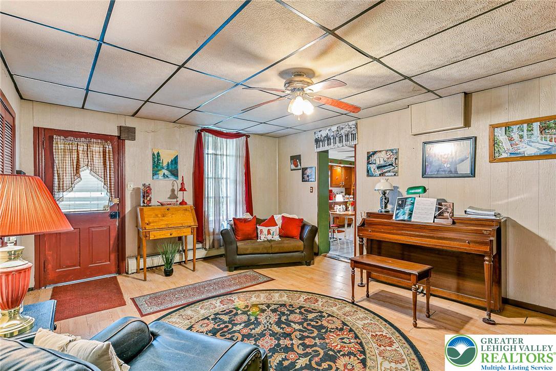 174 North Chestnut Street Bath, PA 18014 - Photo 6 of 20 a living room with furniture and a flat screen tv