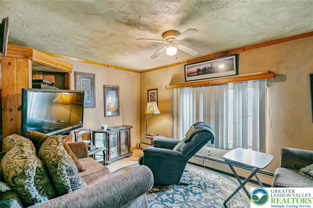 174 North Chestnut Street Bath, PA 18014 - Photo 9 of 20 a living room with furniture and a flat screen tv
