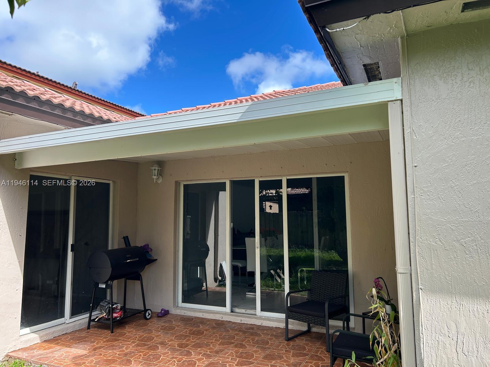 22844 Southwest 114th Avenue Miami, FL 33170 - Photo 28 of 40 a view of a entryway door of the house