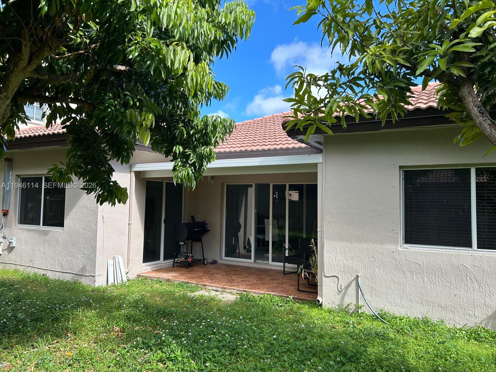 22844 Southwest 114th Avenue Miami, FL 33170 - Photo 29 of 40 a view of a entryway in front of house
