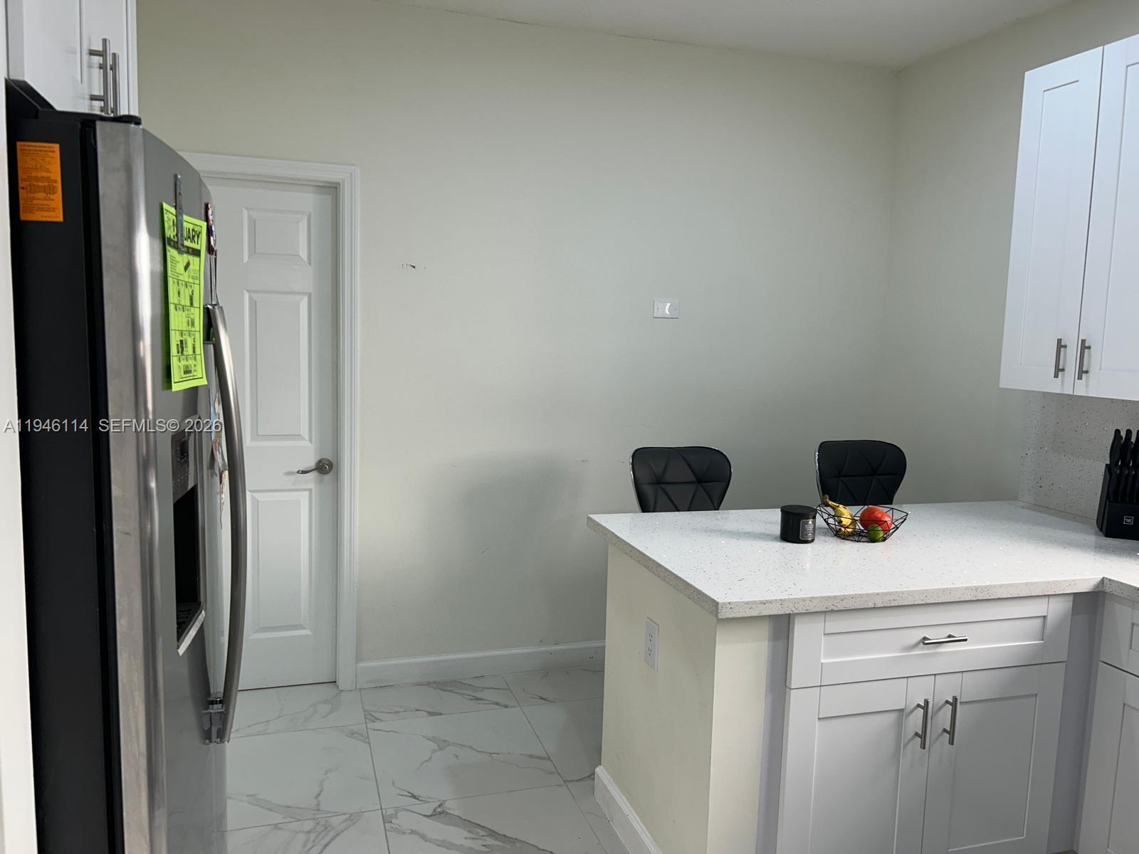 22844 Southwest 114th Avenue Miami, FL 33170 - Photo 36 of 40 a utility room with dryer and washer