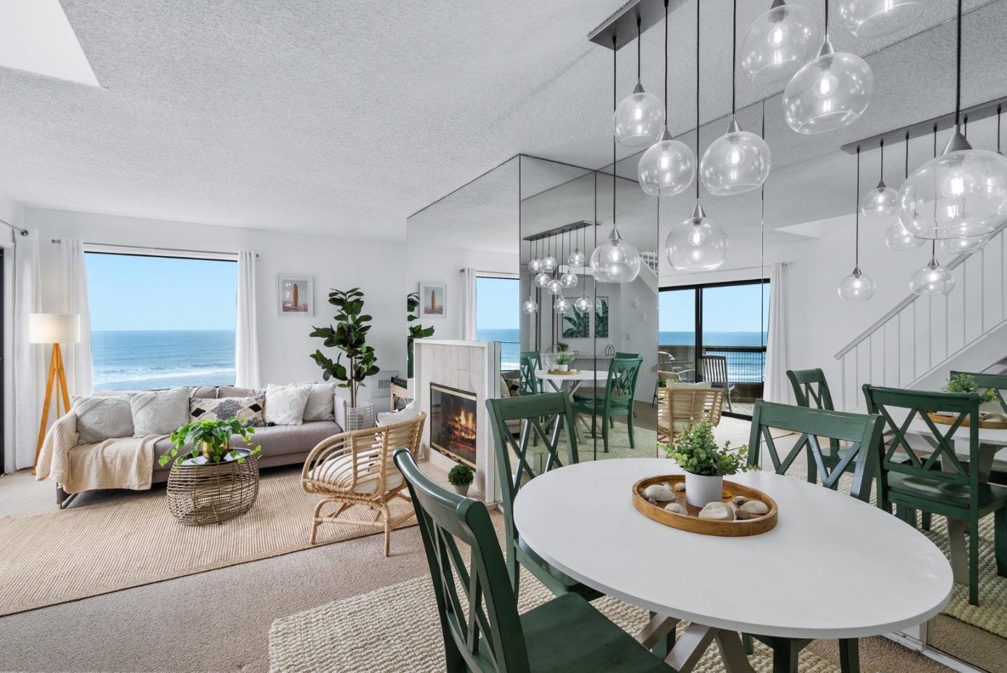 101 Shell Road, Unit 32 Watsonville, CA 95076 - Photo 15 of 44 a view of a dining room with furniture a chandelier and wooden floor