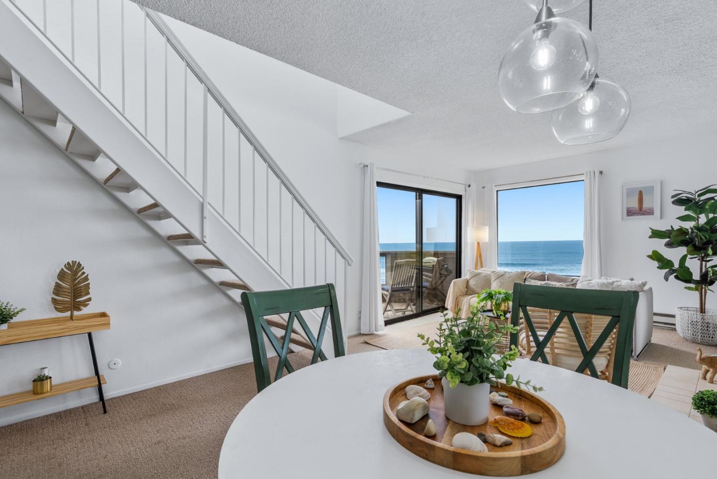 101 Shell Road, Unit 32 Watsonville, CA 95076 - Photo 16 of 44 a living room with furniture and a chandelier