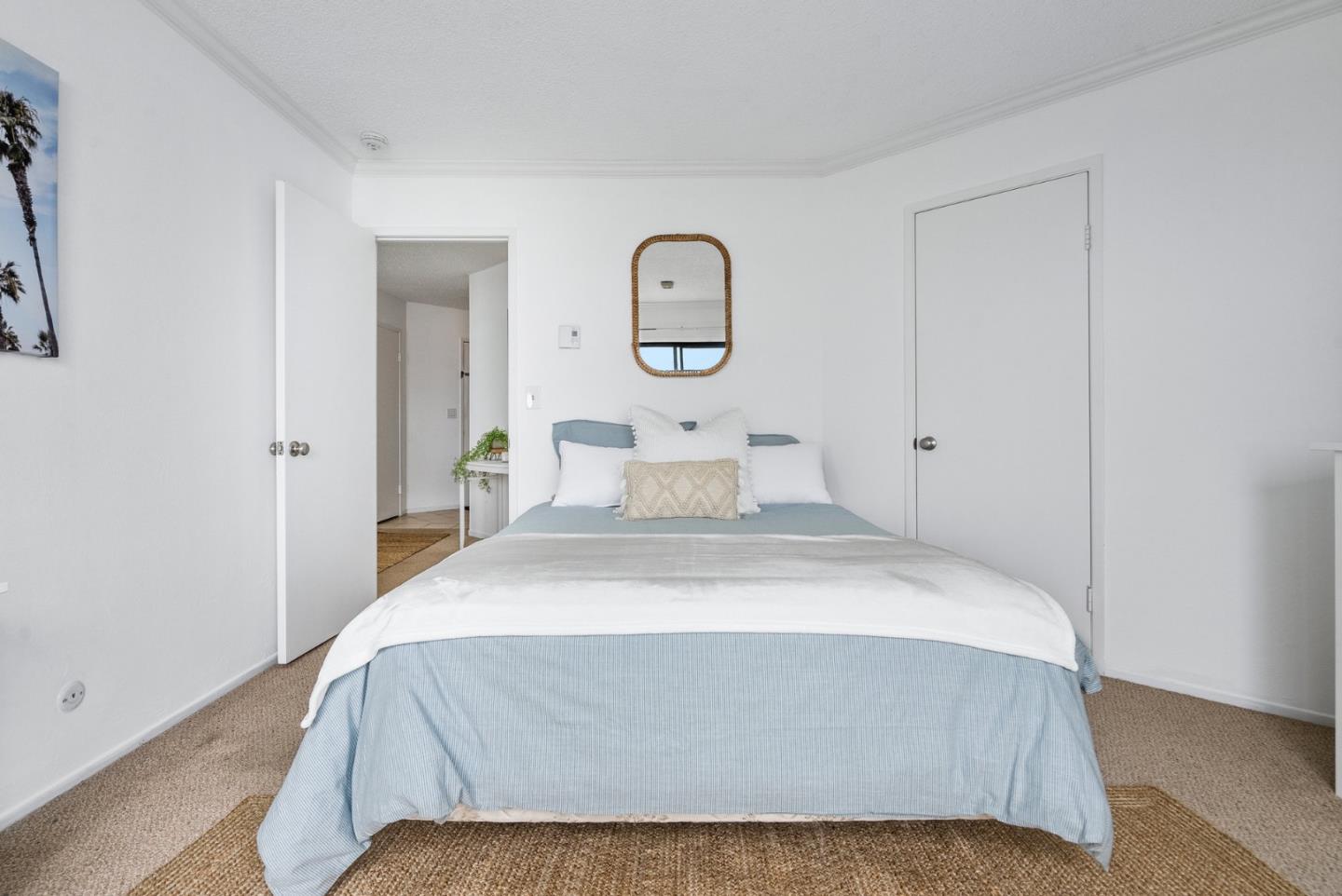 101 Shell Road, Unit 32 Watsonville, CA 95076 - Photo 27 of 44 a bedroom with a bed and window