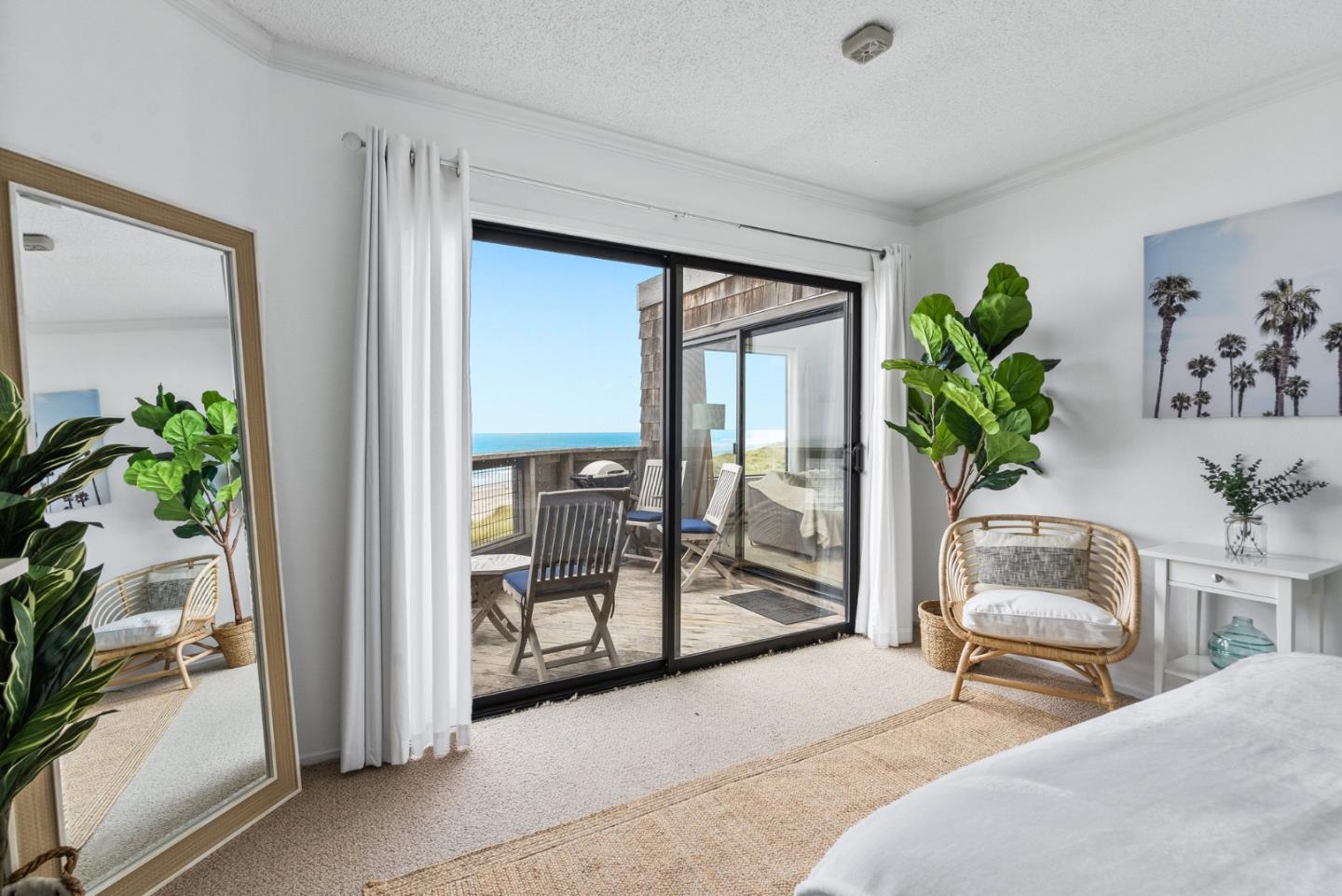 101 Shell Road, Unit 32 Watsonville, CA 95076 - Photo 28 of 44 a bedroom with furniture and a potted plant