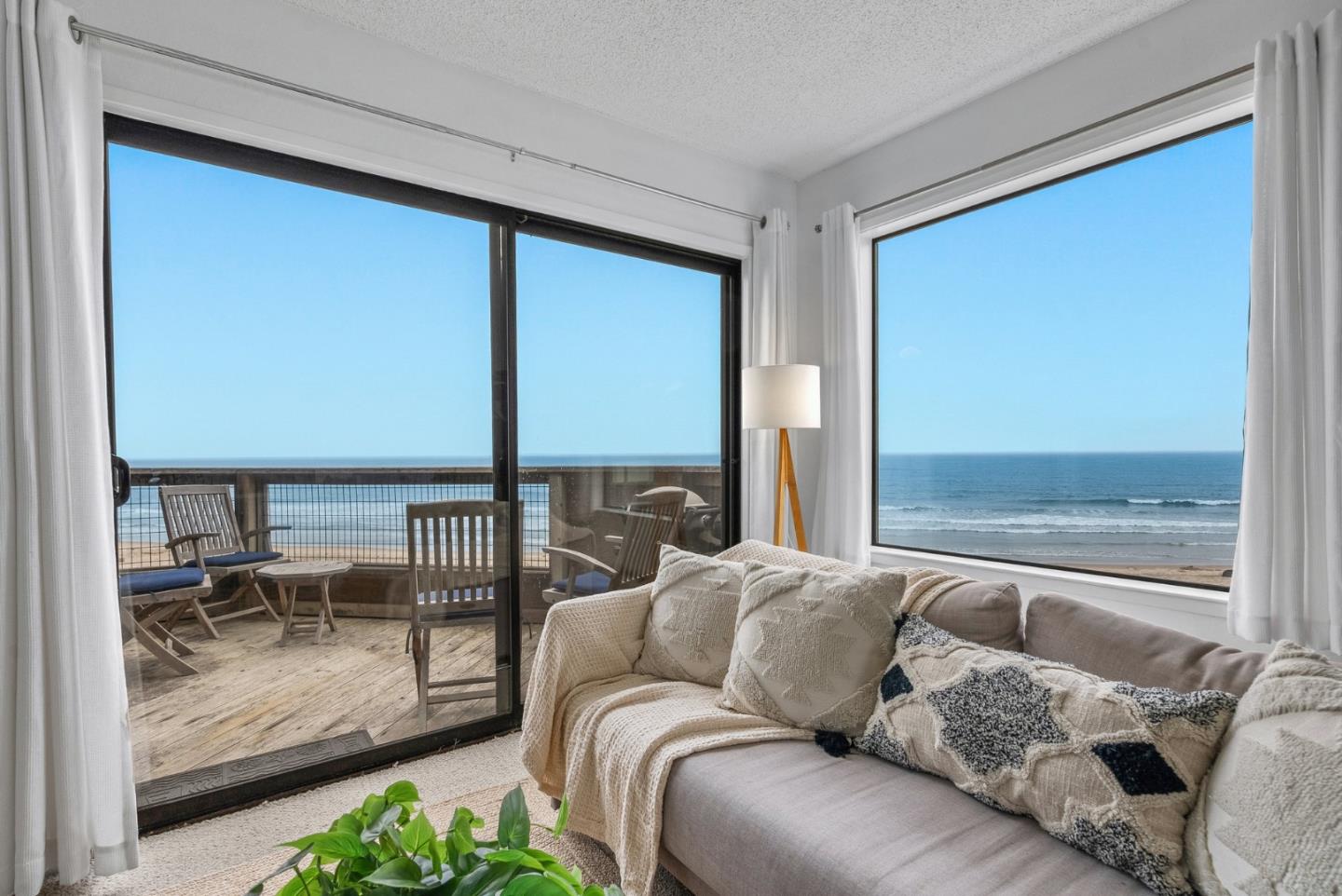 101 Shell Road, Unit 32 Watsonville, CA 95076 - Photo 7 of 44 a living room with a large window and furniture
