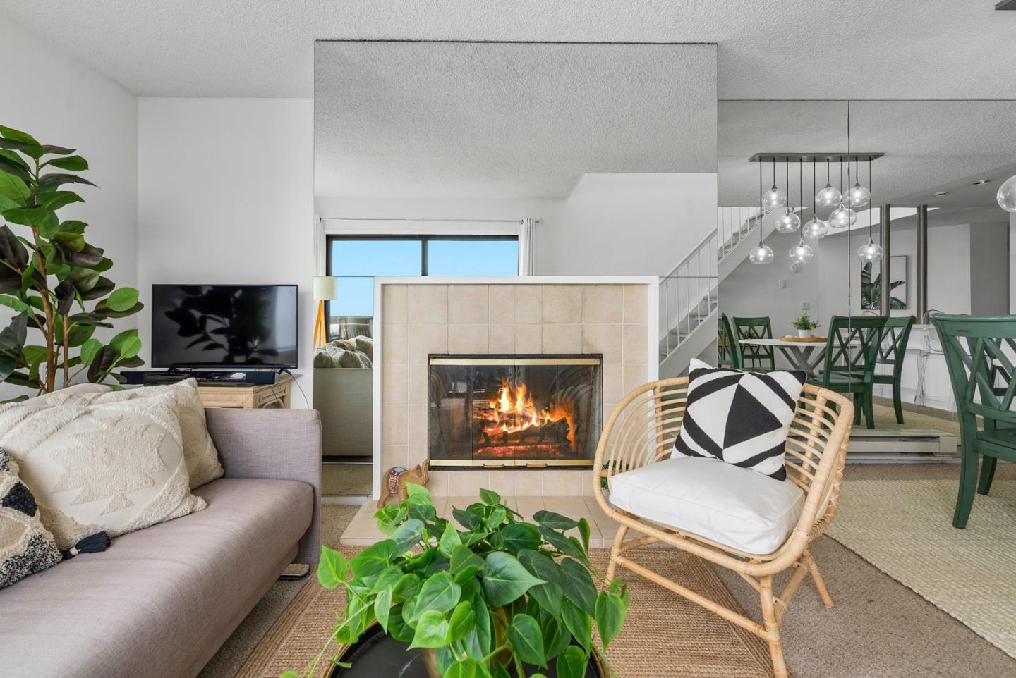 101 Shell Road, Unit 32 Watsonville, CA 95076 - Photo 8 of 44 a living room with furniture and a fireplace