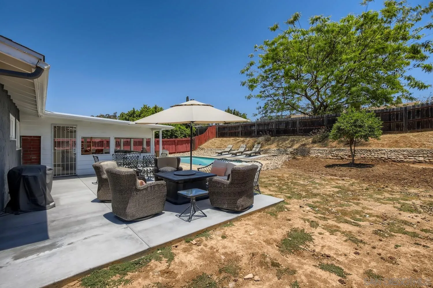 14167 Frame Road Poway, CA 92064 - Photo 23 of 27 a view of a house with backyard porch and furniture