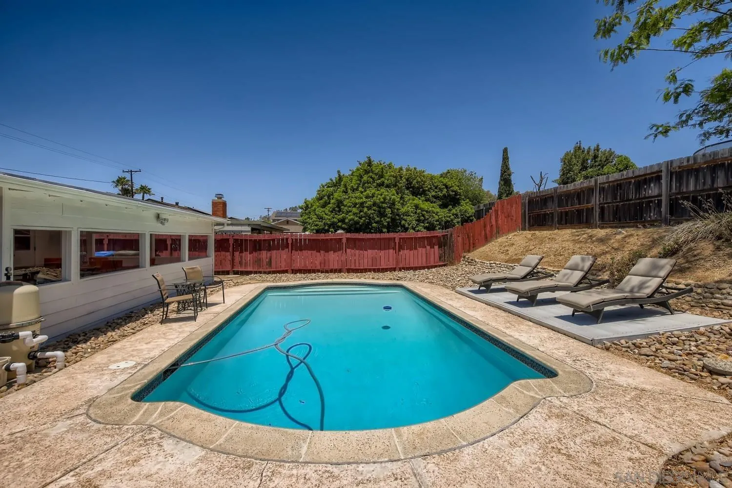 14167 Frame Road Poway, CA 92064 - Photo 25 of 27 a view of a swimming pool with chairs