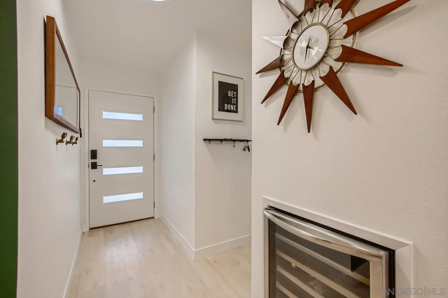 14167 Frame Road Poway, CA 92064 - Photo 4 of 27 a view of a hallway with closet and wooden floor