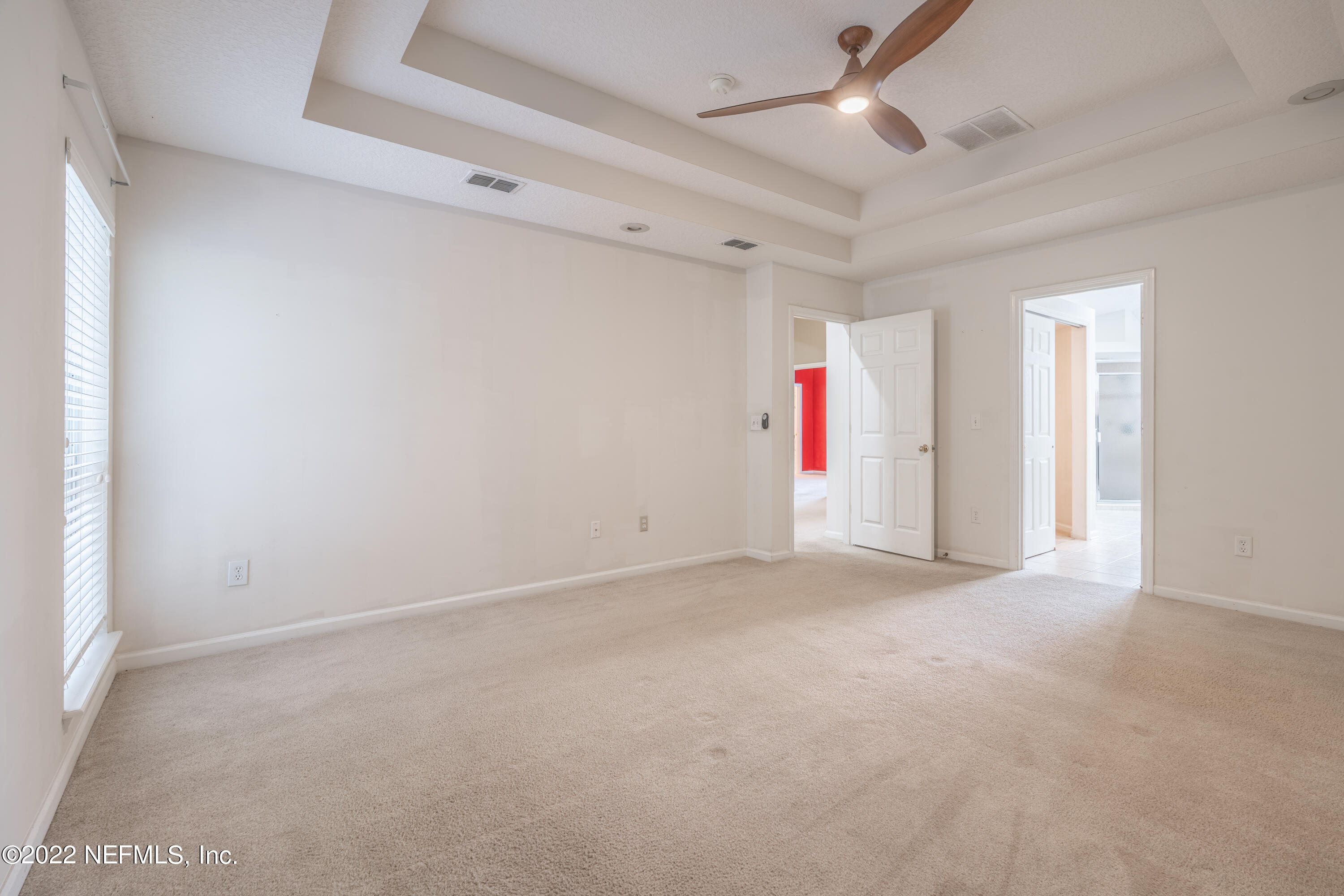 1535 Summerdown Way St. Johns, FL 32259 - Photo 16 of 38 en empty room with ceiling fan and window
