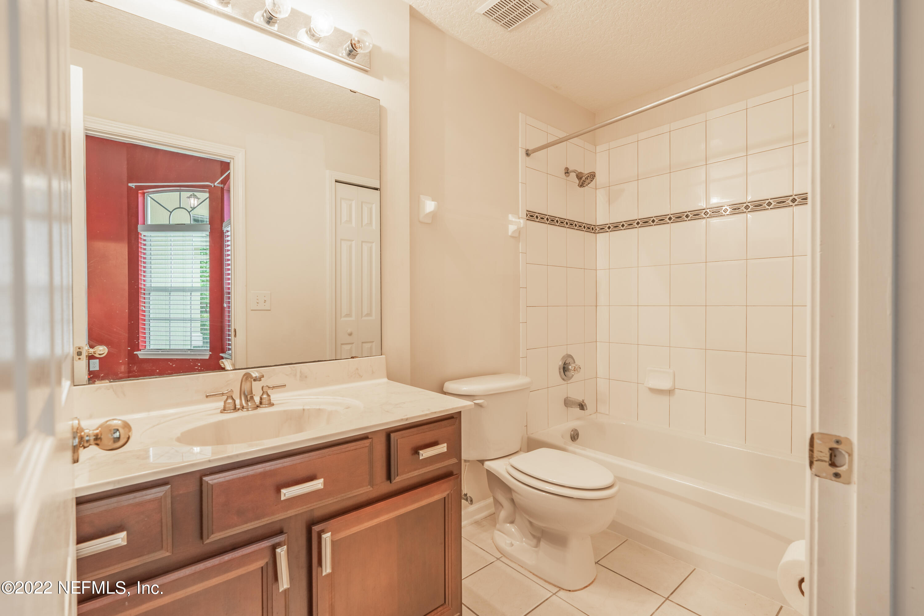 1535 Summerdown Way St. Johns, FL 32259 - Photo 7 of 38 a bathroom with a sink a toilet and shower