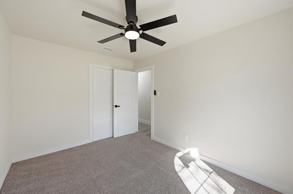 2804 Bent Tree Lane Arlington, TX 76016 - Photo 28 of 32 wooden floor in an empty room