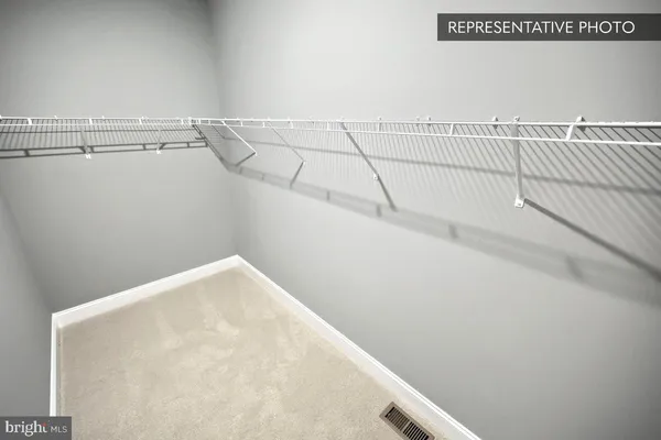a view of a room with racks on the wall