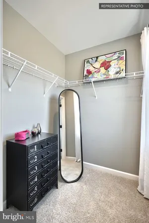 a room with toys and dresser