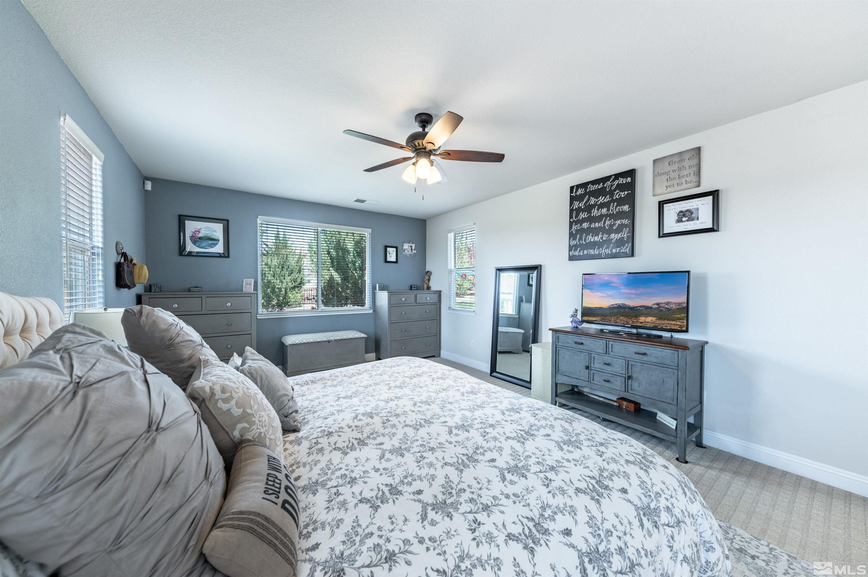 7080 Truth Drive Sparks, NV 89436 - Photo 17 of 40 a bed room with a bed and a television