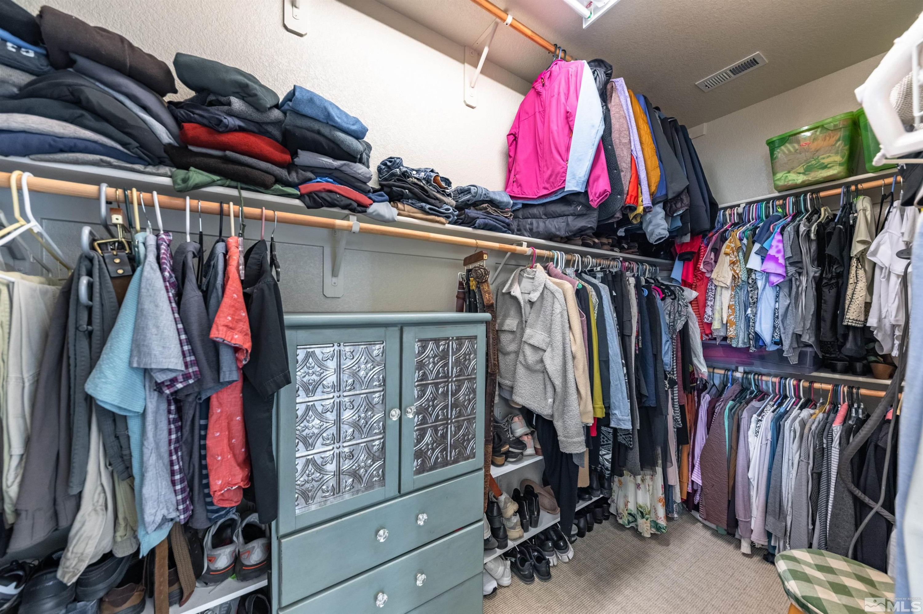 7080 Truth Drive Sparks, NV 89436 - Photo 21 of 40 a view of walk in closet with clothes