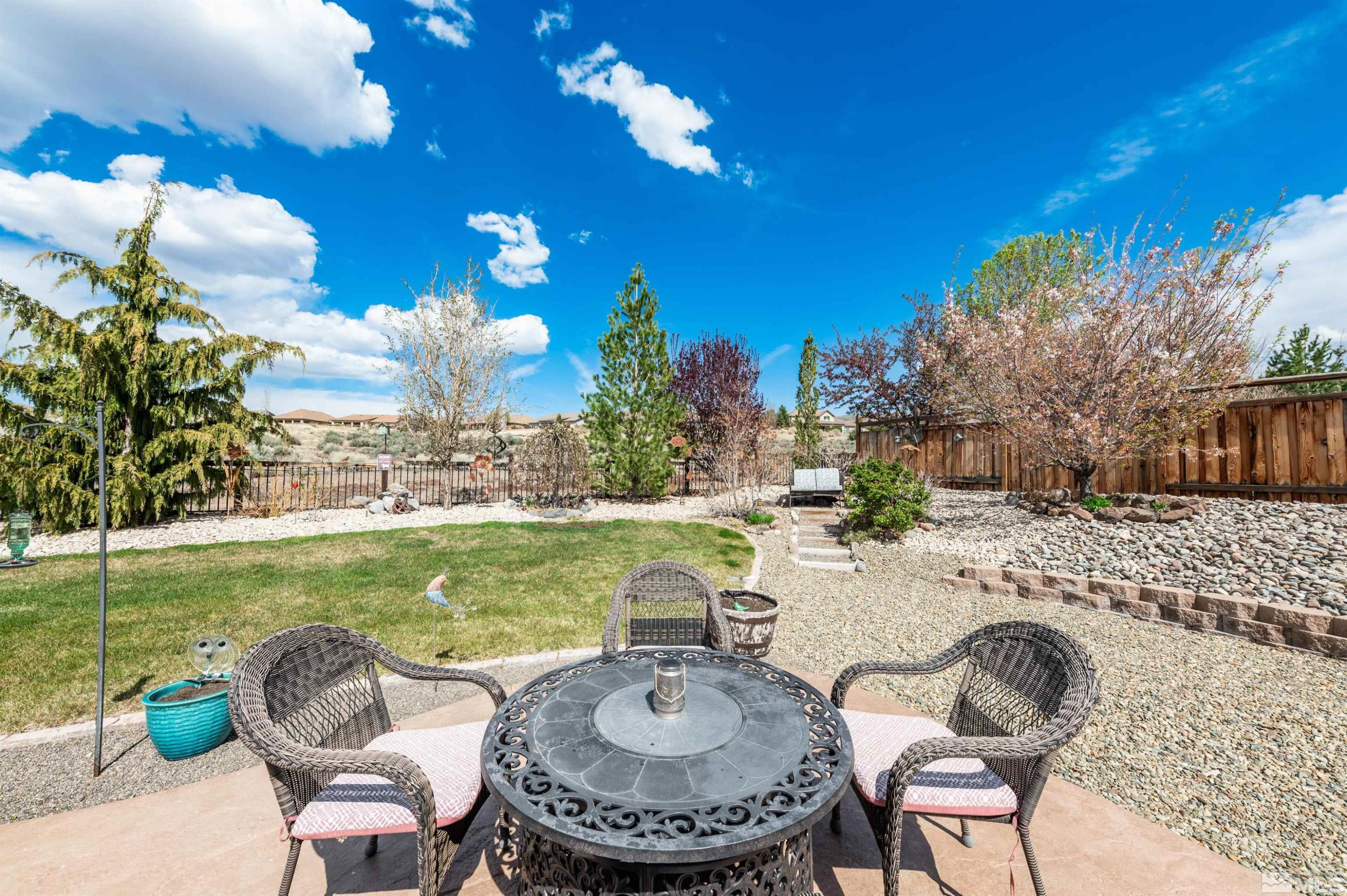 7080 Truth Drive Sparks, NV 89436 - Photo 29 of 40 a view of a swimming pool and outdoor seating