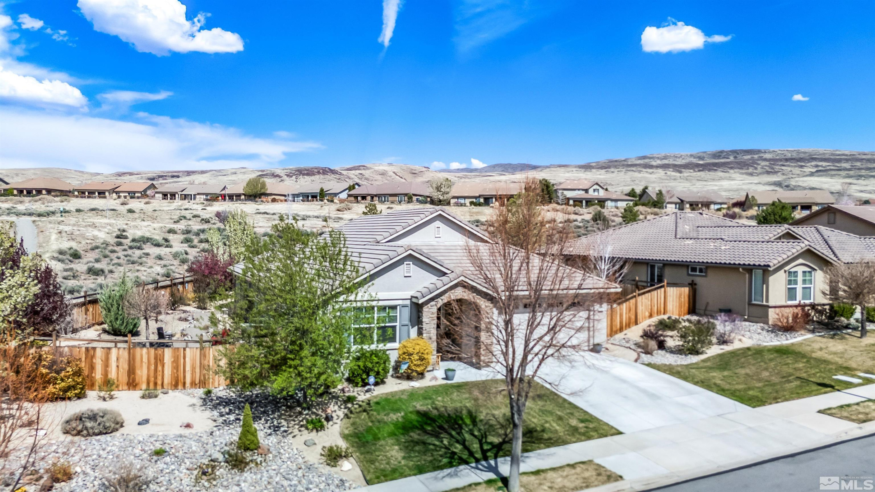 7080 Truth Drive Sparks, NV 89436 - Photo 3 of 40 a view of a city with tall buildings