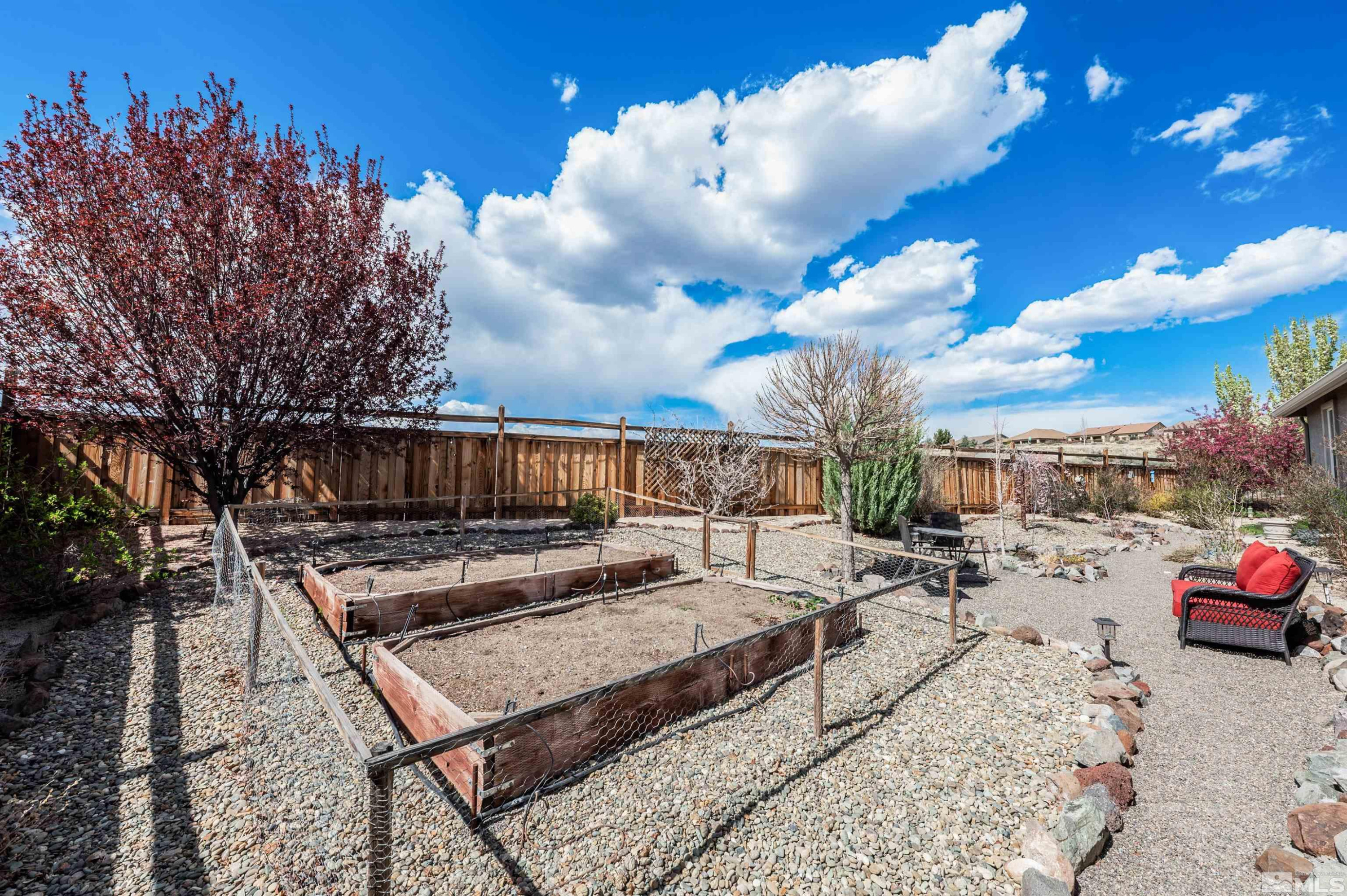 7080 Truth Drive Sparks, NV 89436 - Photo 34 of 40 a view of a terrace with furniture and a fire pit