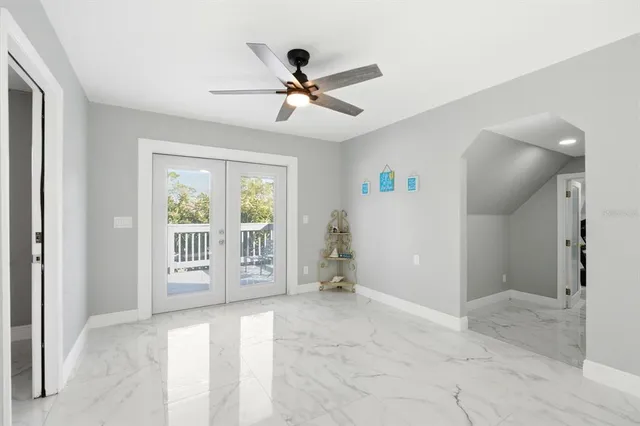 a room with gym equipment and equipment