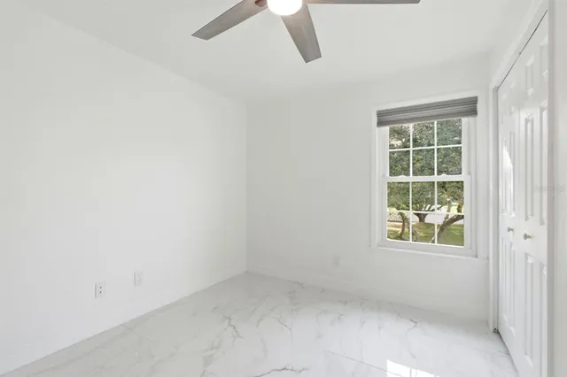 a view of balcony with wooden floor and outdoor seating