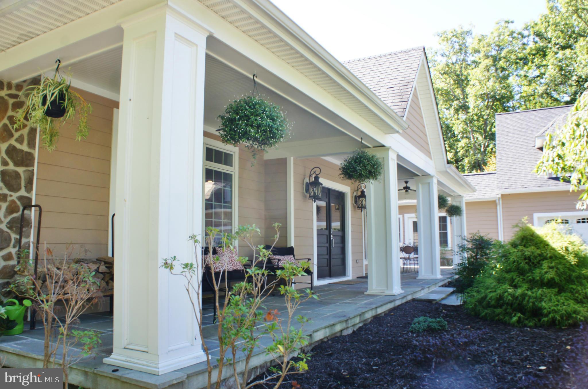 13292 Olivet Road Lusby, MD 20657 - Photo 2 of 30 Expansive front porch! 3 Car Garage!