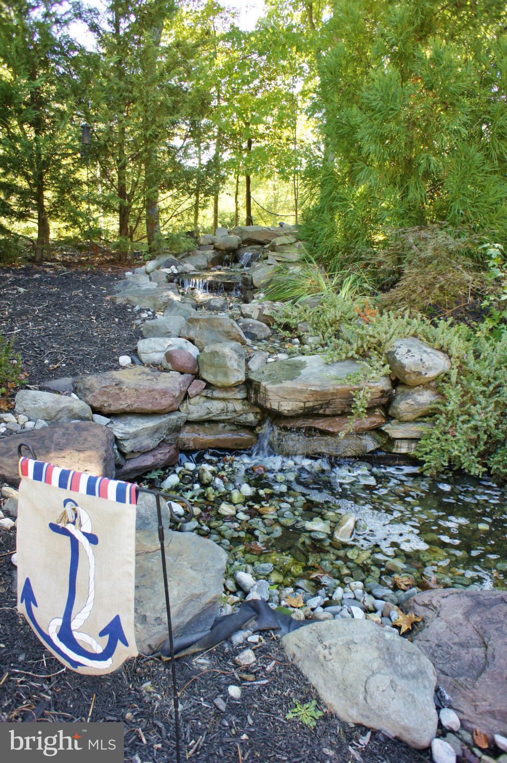 13292 Olivet Road Lusby, MD 20657 - Photo 11 of 30 Peaceful Waterfall trickles down to pond!