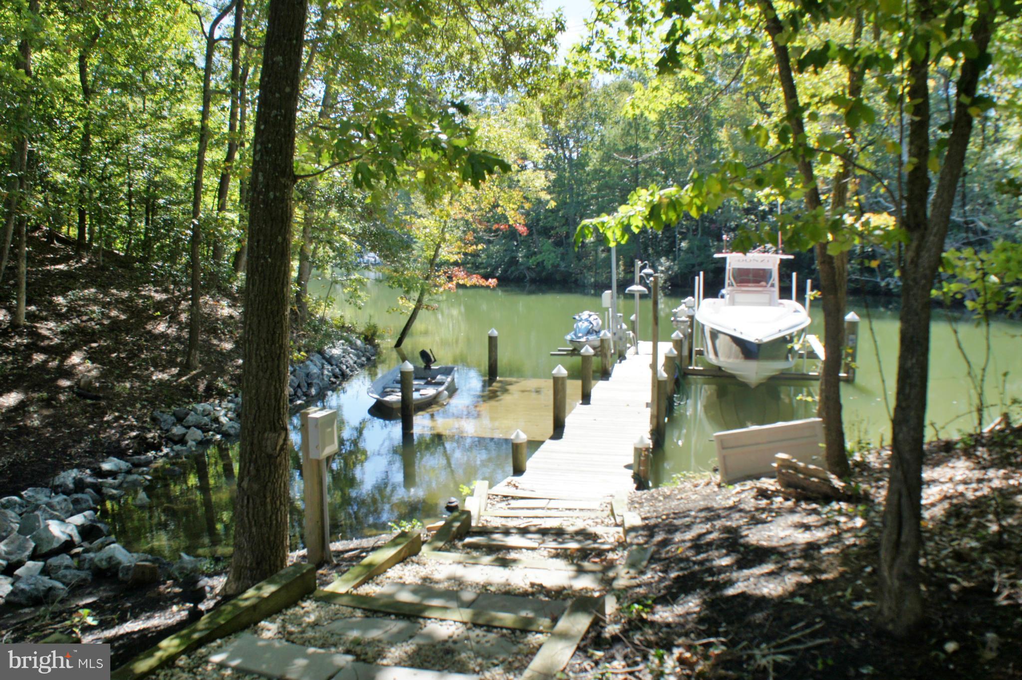 13292 Olivet Road Lusby, MD 20657 - Photo 12 of 30 Gentle walkway to pier - protected deep water!